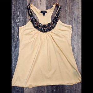 Yellow beaded tank